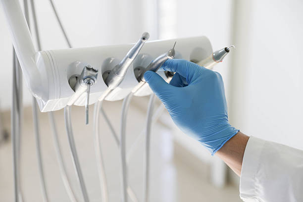 Professional Root Canal Treatment technician working in Greensburg, IN